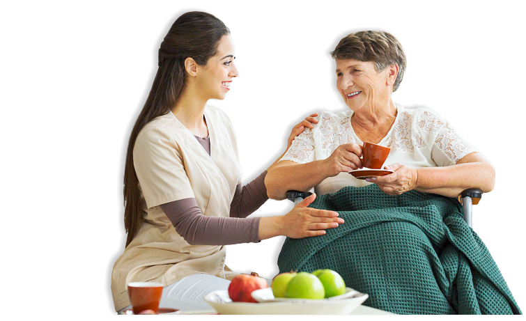 caregiver preparing fruits and served a tea to her senior woman patient